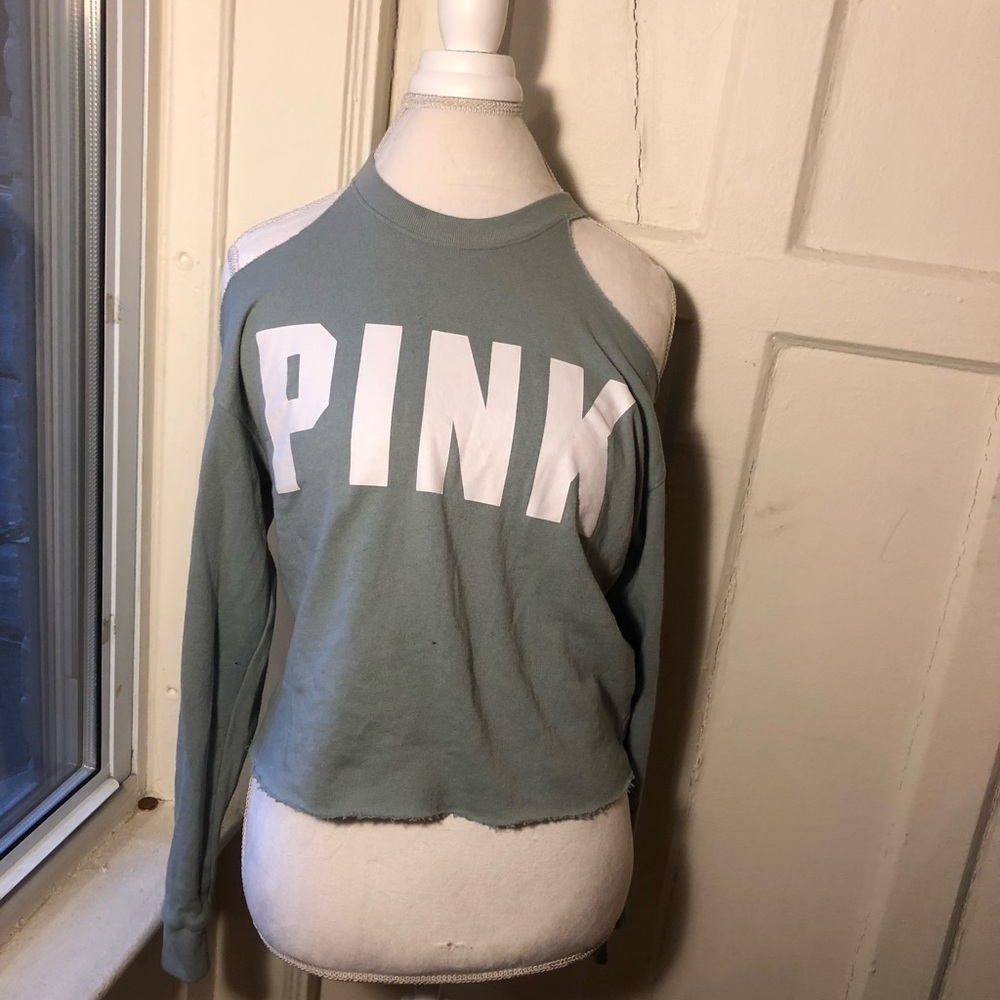 Women’s shoulder cut pink sweater